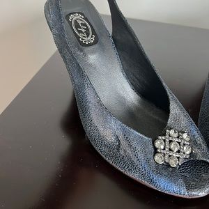 New never worn Peep toe, slink back with glitter accent heels